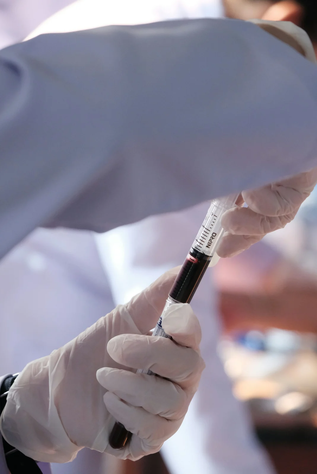 A precise dose being drawn up in a clinical setting
